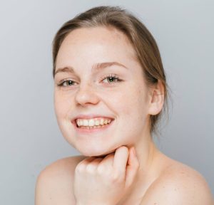 Person smiling about Hydrafacial steps