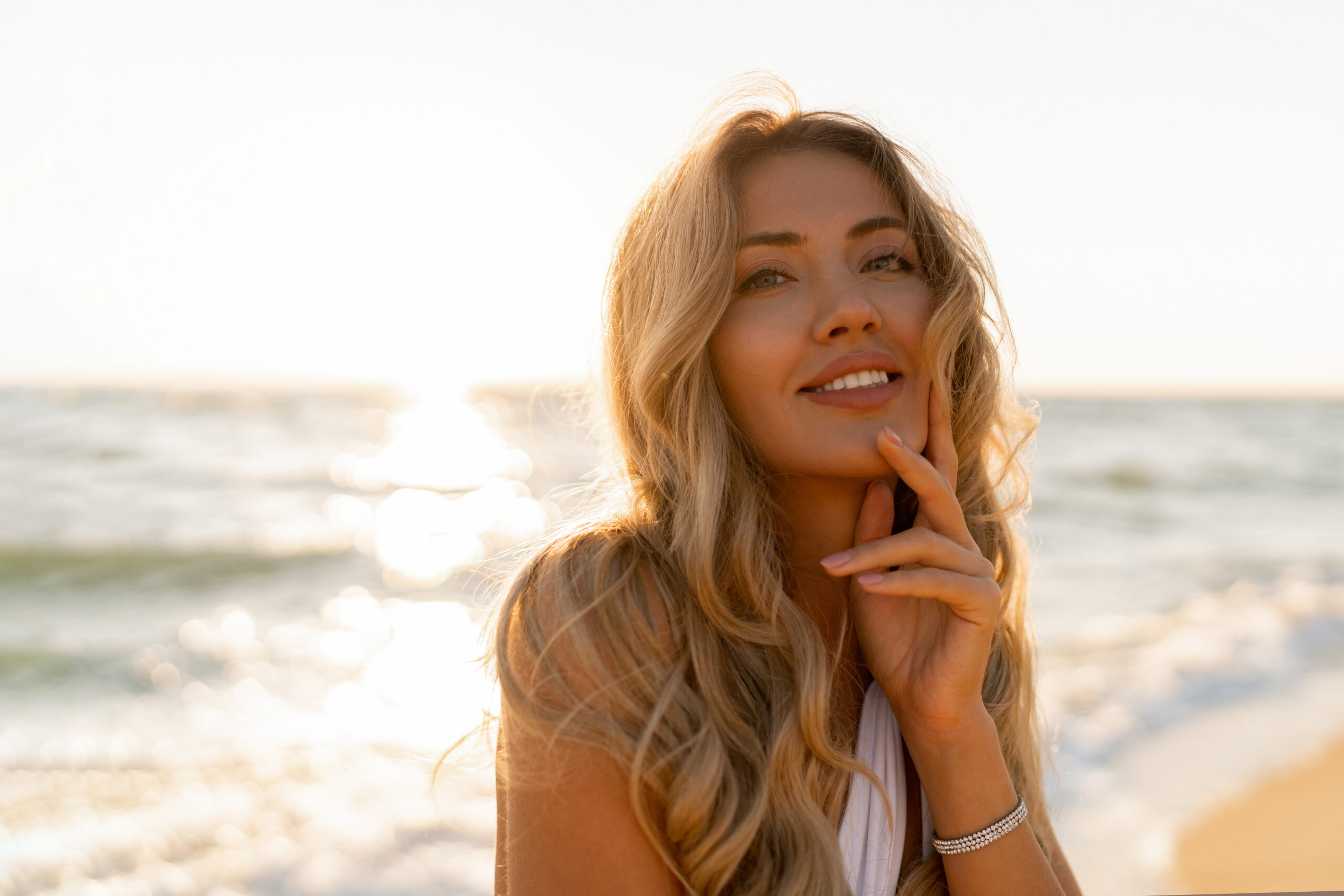 A woman enjoying the Florida sun, whose skin damage SkinPen microneedling can help reverse at Coastal Health & Medical Spa in Jacksonville