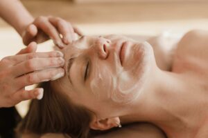 Woman having her skin cleaned before a skin facial in Jacksonville