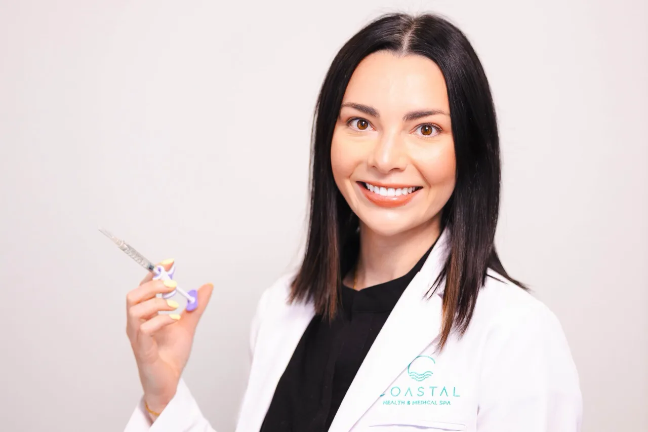 Dr. Olivia Jose, Nurse Practitioner, preparing a neuromodulator syringe before a brow lift treatment at Coastal Health & Medical Spa in Jacksonville
