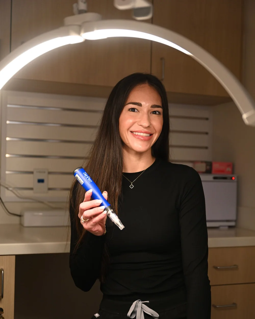 Danielle Hancock, Lead Aesthetician, in the facial treatment room at Coastal Health & Medical Spa in Jacksonville, FL