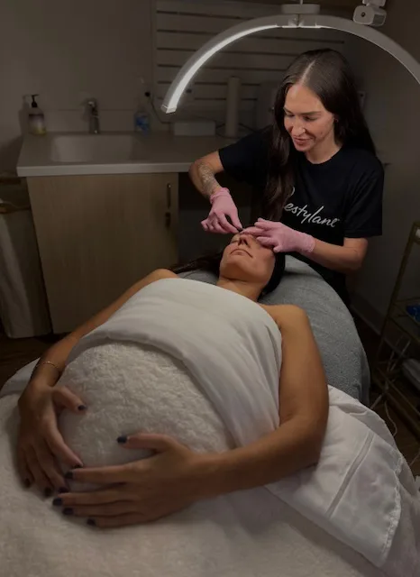 Danielle Hancock performing a professional facial treatment on a client at Coastal Health & Medical Spa in Jacksonville, FL