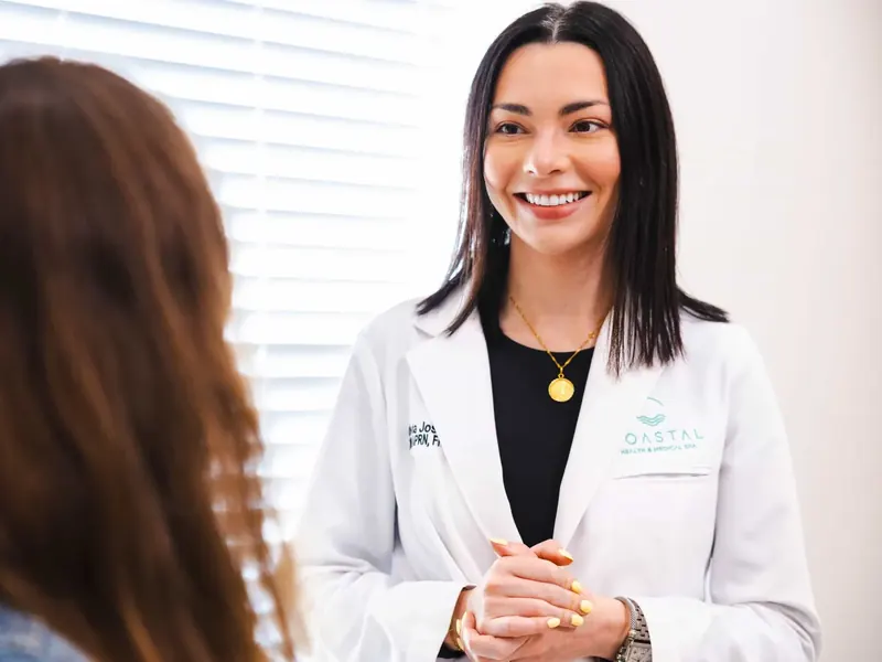 Provider treating the smile line area during a nasolabial fold filler appointment at Coastal Health & Medical Spa in Jacksonville
