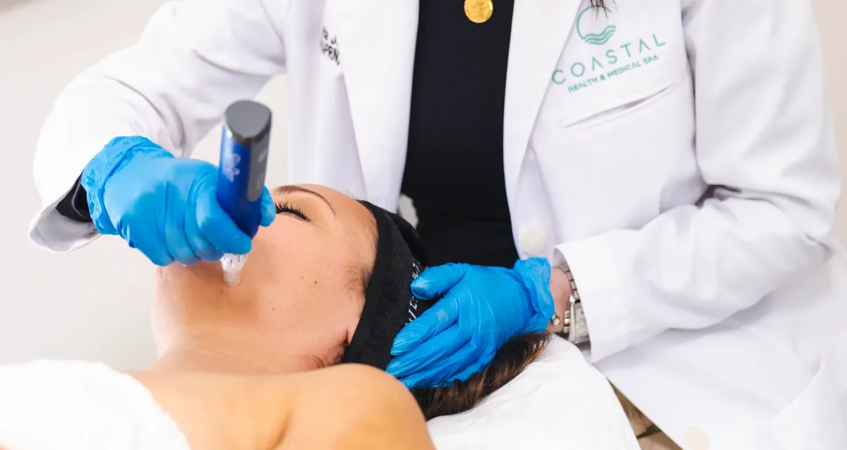 Close-up of SkinPen microneedling on a patient's cheek at Coastal Health & Medical Spa in Jacksonville, FL, the collagen-building treatment used for deeper acne scars that dermaplaning cannot reach