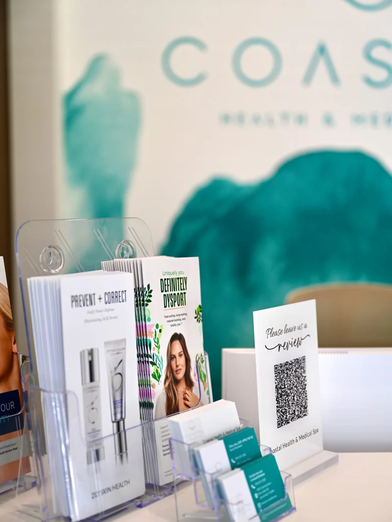 Skincare and treatment display at the front desk of Coastal Health & Medical Spa in Jacksonville, FL