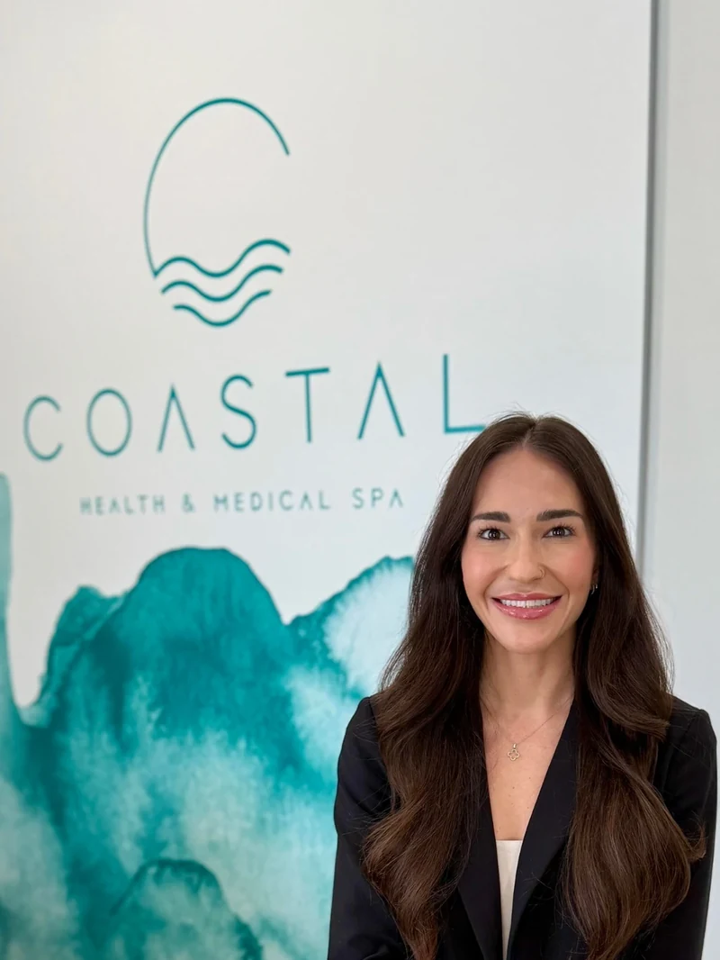 Danielle Hancock, Licensed Aesthetician and certified ZO Skin Health Expert, in the lobby of Coastal Health & Medical Spa in Jacksonville, FL