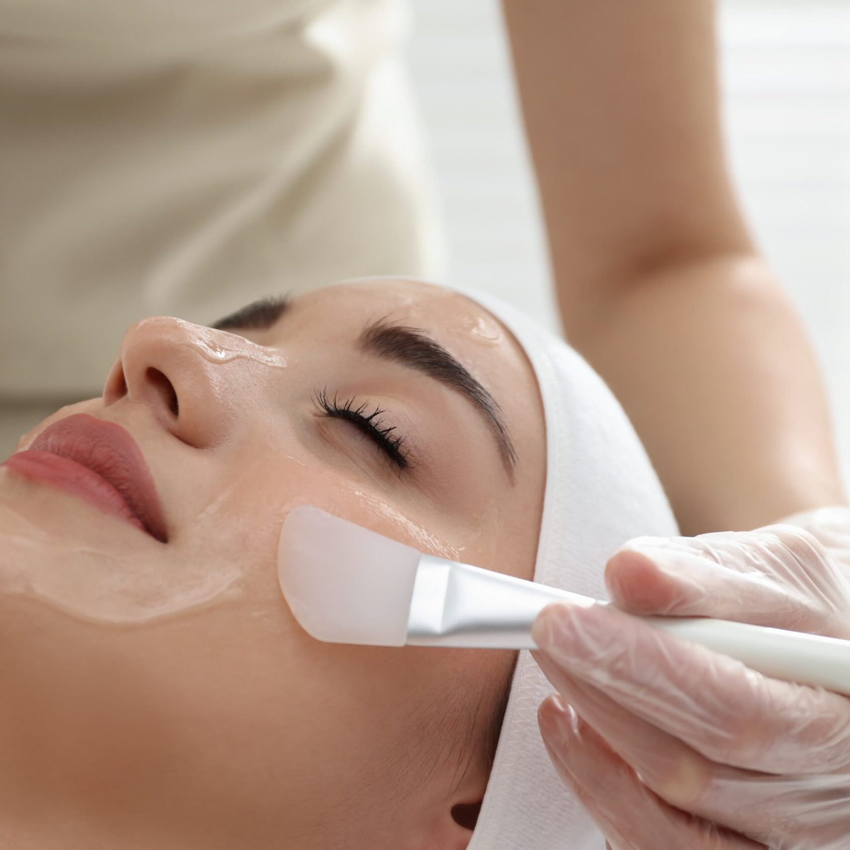 Woman getting Chemical Peel treatment in a luxury med spa