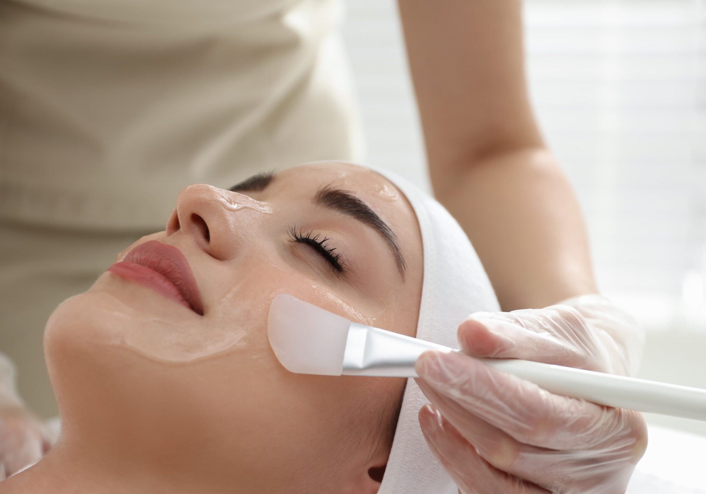 Woman getting Chemical Peel treatment in a luxury med spa