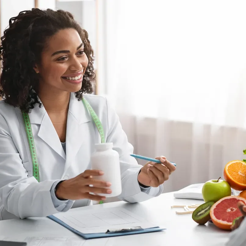 Physician working with patient on weight loss with bhrt jacksonville