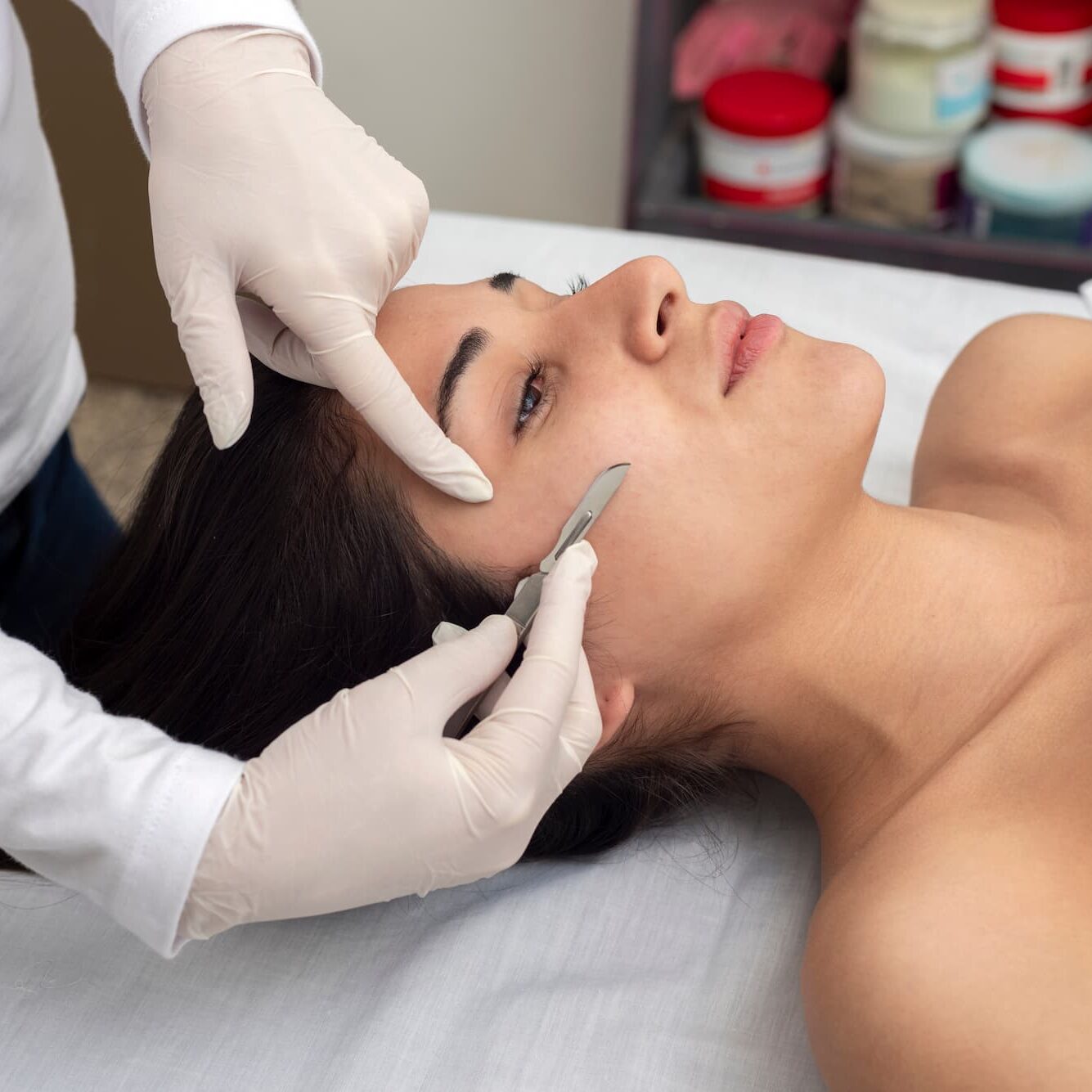 A young woman getting a dermaplaning treatment in Jacksonville