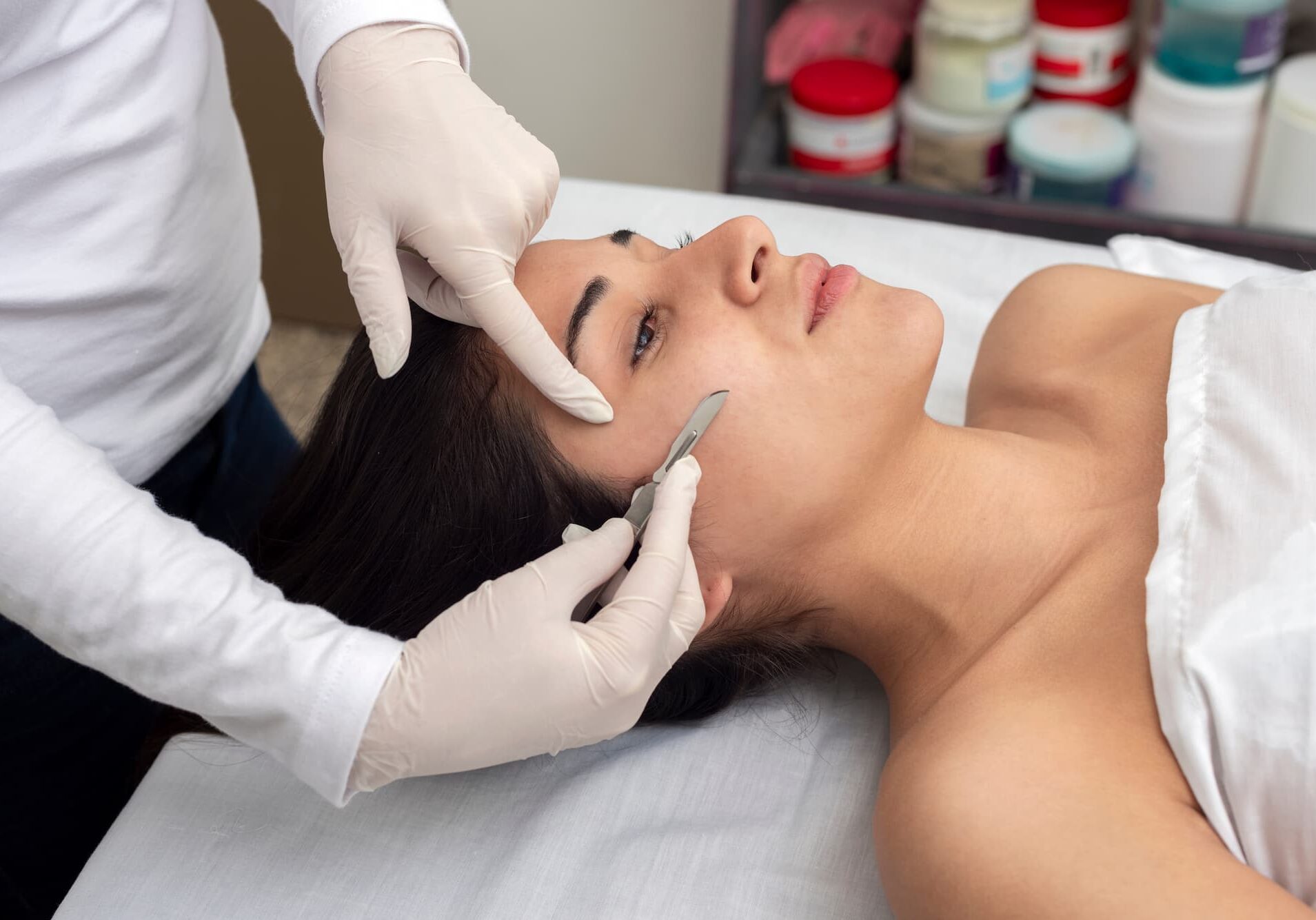 A young woman getting a dermaplaning treatment in Jacksonville