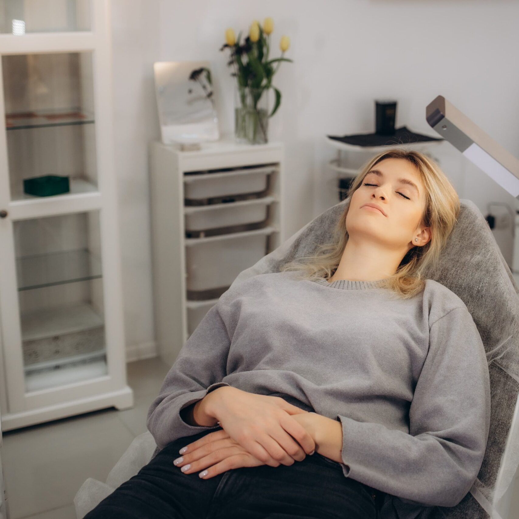 Woman waiting for protein rich plasma hair restoration in jacksonville